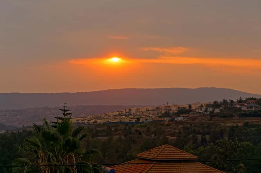 Kigali: Sunset Drinks, Dinner, and Nightlife Tour - Sunset Hour at a Rooftop View: The Best Kind of Start
